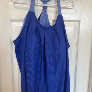 Cabi sheer exercise top with built-in bra. Purple in color size XL.